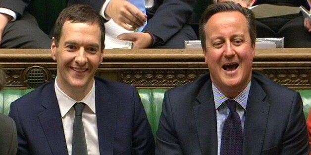 Chancellor of the Exchequer, George Osborne and Prime Minister David Cameron listens as shadow chancellor John McDonnell responds to Osborne after he delivered his joint Autumn Statement and Spending Review to MPs in the House of Commons, London.