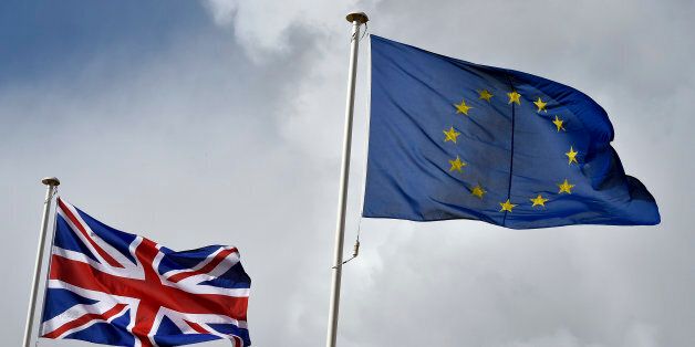 File photo dated 27/11/2015 of the Union flag flutters next to the EU flag. A deal on changes to the UK's relationship with Brussels will be "very difficult" to achieve before Christmas but the president of the European Council said he would help David Cameron if he gambled on pressing for an agreement at a meeting later this month.