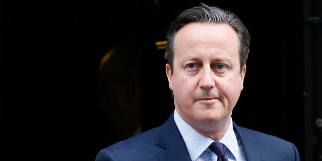 Britain's Prime Minister David Cameron leaves 10 Downing Street to attend Parliament in London, Thursday, Nov. 26, 2015. Prime Minister David Cameron says Britain must join airstrikes in Syria to deny the Islamic State group a