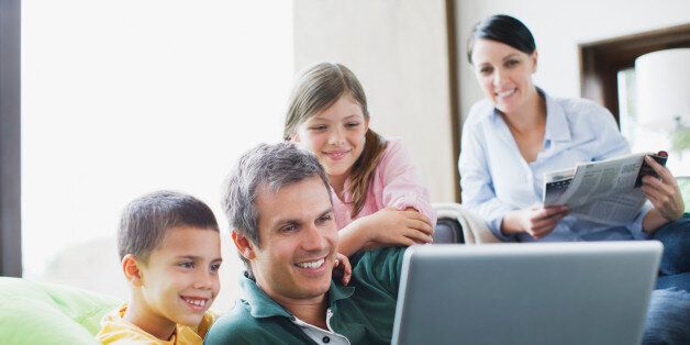 Family using laptop together