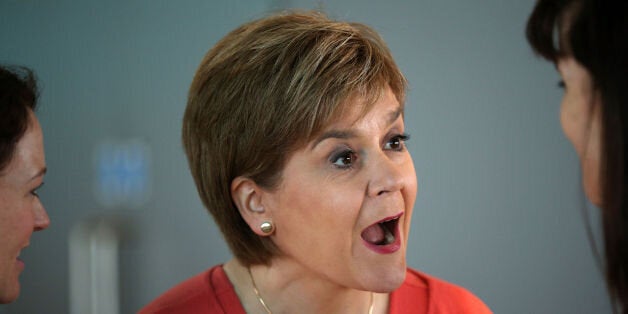 First Minister of Scotland Nicola Sturgeon MSP speaks with Emma Tucker, the Deputy Editor of The Times as she waits to be welcomed on stage to take questions during a Q&A session at the Times CEO summit at The Times offices in London.