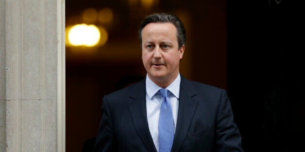 David Cameron leaves 10, Downing Street in London, to go to the Houses of Parliament for a debate and vote on launching airstrikes against Islamic State extremists inside Syria, Wednesday, Dec. 2, 2015. The vote expected Wednesday evening would authorize bombing inside Syria.