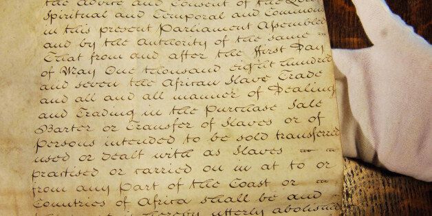 File photo dated 23/03/07 of the original 1806 Foreign Slave Trade Abolition Bill on show at the House of Commons. The 1,000-year-old practice of printing laws on goat and calf skin will continue, a minister has said just days after the House of Lords signalled the tradition would end.