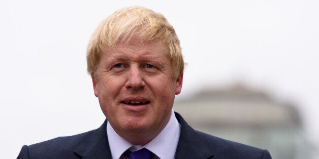 LONDON, ENGLAND - NOVEMBER 19: Mayor of London Boris Johnson poses for photographs at the launch of London's first cycle superhighway on November 19, 2015 in London, England. Superhighway 5 (CS5) is the capital's first two lane fully segregated cycle superhighway. (Photo by Ben Pruchnie/Getty Images)