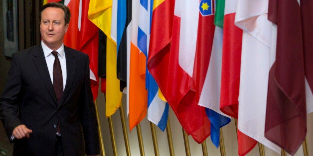 British Prime Minister David Cameron leaves after an EU summit in Brussels on Friday, June 26, 2015. European leaders have tasked finance ministers from the euro countries with concluding a debt financing agreement with Greece over the weekend, just days before Athens has to meet a crucial debt deadline. (AP Photo/Virginia Mayo)