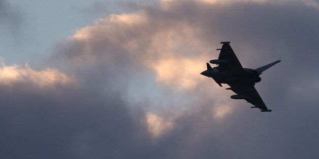 AKROTIRI, CYPRUS - DECEMBER 03: A RAF Typhoon arrives at RAF Akrotiri on December 3, 2015 in Akrotiri, Cyprus. The RAF has sent two further Tornado aircraft and six Typoons to bolster aircraft now flying sorties to both Iraq and Syria. The UK government voted yesterday to authorise air strikes against so-called Islamic State targets in Syria. (Photo by Matt Cardy/Getty Images)