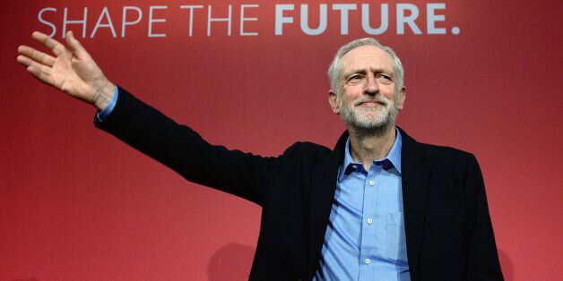 Jeremy Corbyn takes to the stage after he was announced as the Labour Party's new leader at a special conference at the QEII Centre in London.