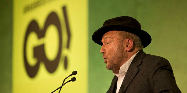 Unannounced mystery guest speaker British politician George Galloway makes a speech at a rally held by the Grassroots Out (GO), anti-EU campaign group at the Queen Elizabeth II conference centre in London, held to coincide with the EU summit in Brussels, Friday, Feb. 19, 2016. British Prime Minister David Cameron pushed a summit into overtime Friday after a second day of tense talks with weary European Union leaders unwilling to fully meet his demands for a less intrusive EU. (AP Photo/Matt Dunh