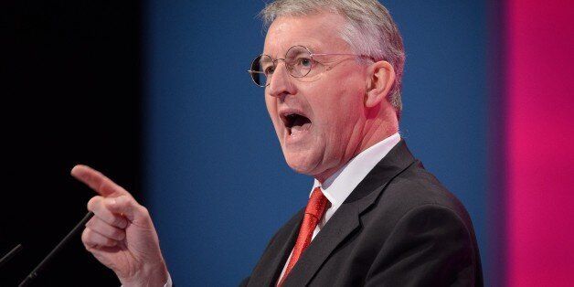 British Labour Party politician Hilary Benn addresses delegates in the main hall of Manchester Central, in Manchester on September 21, 2014 on the first day of the Labour Party conference. AFP PHOTO/LEON NEAL (Photo credit should read LEON NEAL/AFP/Getty Images)