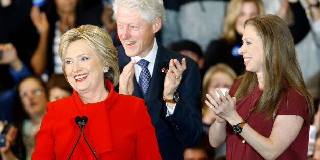 Democratic presidential candidate Hillary Clinton speaks in front of former President Bill Clinton and daughter Chelsea during a caucus night rally at Drake University in Des Moines, Iowa, Monday, Feb. 1, 2016. (AP Photo/Patrick Semansky)