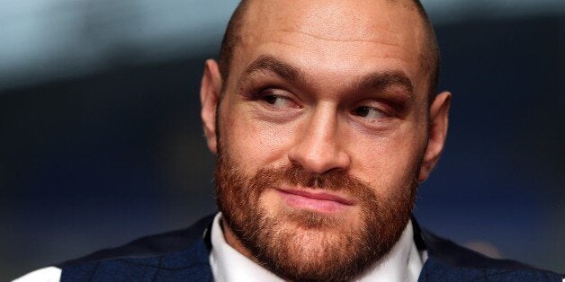 BOLTON, ENGLAND - NOVEMBER 30: Tyson Fury speaks at a press conference at the Macron Stadium on November 30, 2015 in Bolton, England. (Photo by Chris Brunskill/Getty Images)