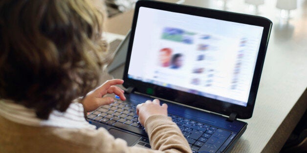 Boy using laptop