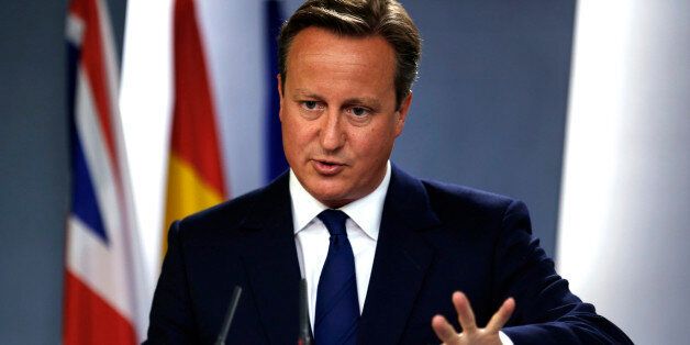 Britain's Prime Minister David Cameron talks to journalists during a joint news conference with his Spanish counterpart Mariano Rajoy after their meeting at the Moncloa Palace in Madrid, Spain, Friday, Sept. 4, 2015. Cameron was on Spain for an official visit after meeting his Portuguese counterpart Pedro Passos Coelho in Lisbon on Friday morning. (AP Photo/Francisco Seco)