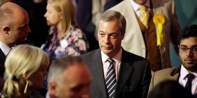 Nigel Farage, leader of the U.K. Independence Party (UKIP), center, waits for the results for the constituency of Thanet South to be announced in the 2015 general election in Thanet, U.K., on Friday, May 8, 2015. David Cameron is poised to return as U.K. prime minister at the head of majority Conservative government after pulling off a surprise election victory that was helped by a landslide for nationalists in Scotland. Photographer: Matthew Lloyd/Bloomberg via Getty Images