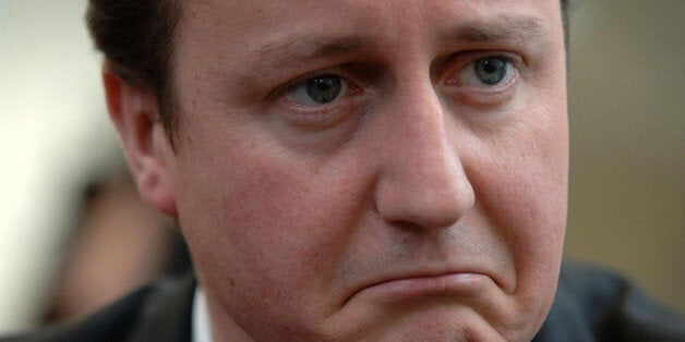 Leader of the Conservative party David Cameron listens to constituents of Reading East talking about the cost of living, in Cafe Giardino, in the Oracle shopping centre, Reading.