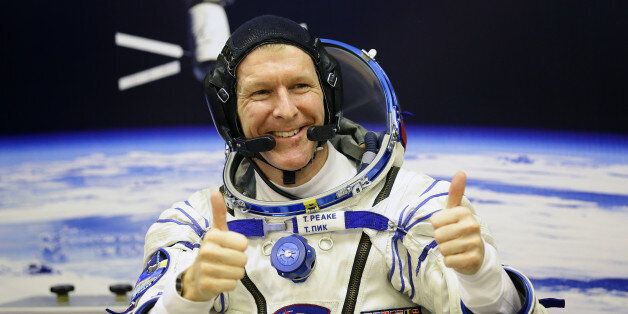 British astronaut Tim Peake gives a thumbs-up during suit pressure testing at the Baikonur Cosmodrome in Kazakhstan, ahead of his trip to the International Space Station. Picture date: Tuesday December 15 2015. Photo credit should read: Gareth Fuller/PA Wire