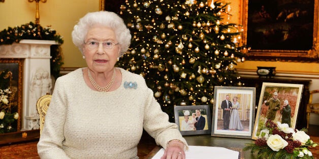 EMBARGOED TO 0001 LOCAL TIME Friday December 25, 2015. Queen Elizabeth II sits at a desk in the 18th Century Room at Buckingham Palace, London, after recording her Christmas Day broadcast to the Commonwealth.