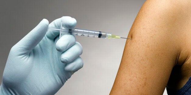 Person receiving a vaccine