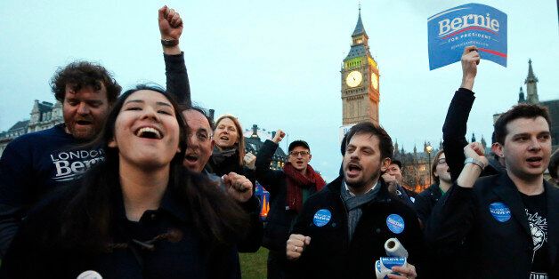 Supporters of democratic candidate Bernie Sanders gather in London, Tuesday, March 1, 2016 as voting begins in the U.S. Democrats Abroad Global Presidential Primary.(AP Photo/Frank Augstein)