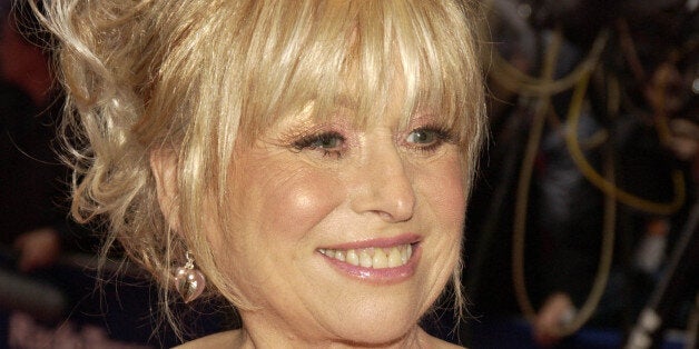 LONDON - APRIL 18: (EMBARGOED FOR PUBLICATION IN UK TABLOID NEWSPAPERS UNTIL 48 HOURS AFTER CREATE DATE AND TIME) Barbara Windsor arrives at the 'British Academy Television Awards' at the Grosvenor House Hotel on April 18, 2004 in London. (Photo by Dave Benett/Getty Images)