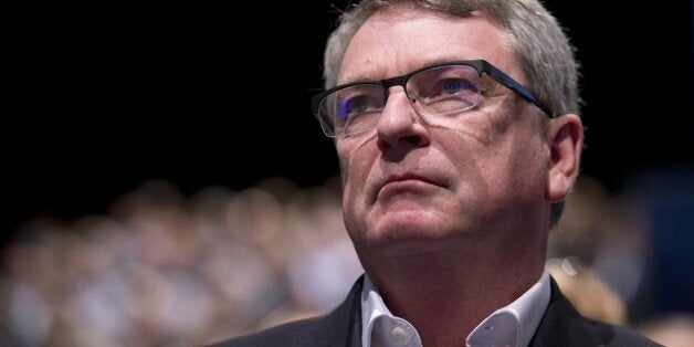 Australian political strategist Lynton Crosby listens to Conservative London Mayoral candidate Zac Goldsmith address delegates on the third day of the annual Conservative party conference in Manchester, north west England, on October 6, 2015. AFP PHOTO / OLI SCARFF (Photo credit should read OLI SCARFF/AFP/Getty Images)