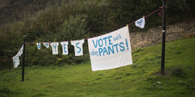 Underwear and laundry hang from a washing line below Edinburgh Castle supporting a Yes vote during the Scottish referendum campaign