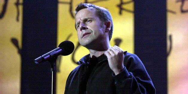 Comedian Jeremy Hardy performing on stage during the 'We Know Where You Live. Live!' event to mark the 40th anniversary of Amnesty International at Wembley Arena.