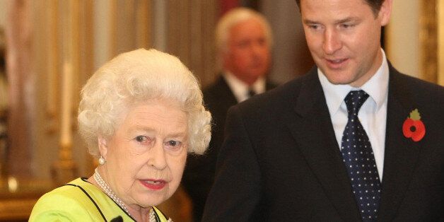 LONDON - NOVEMBER 11: Queen Elizabeth II speaks to Deputy Prime Minister Nick Clegg at the annual Civil Service Awards Reception, at Buckingham Palace, November 11, 2010 in London. (Photo by Dominic Lipinski - WPA Pool/Getty Images)