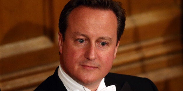 LONDON, ENGLAND - NOVEMBER 10: Prime Minister David Cameron listens to a speech during the the Lord Mayor's Banquet at The Guildhall on November 10, 2014 in London, England. The Lord Mayor of London, Alan Yarrow, is hosting the annual Lord Mayor's Banquet in London's Guildhall which will feature speeches from the Prime Minister and the Archbishop of Canterbury. Alan Yarrow was recently elected 687th Lord Mayor of the City of London, a role that has been in existence since 1189. (Photo by Carl Court/Getty Images)