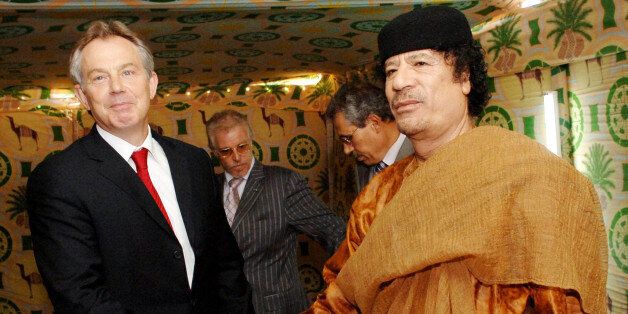 File photo dated 29/05/07 of Tony Blair (left) and Colonel Gaddafi shaking hands at Gaddafi's desert base near Sirte, Libya, as newly released correspondence shows that Mr Blair privately urged the Libyan dictator to stand aside as rebellion erupted against his regime.