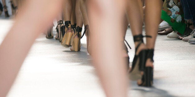 Models at London Fashion Week at at Brewer Street Car Park, in Soho, central London, (Photo by Joel Ryan/Invision/AP)