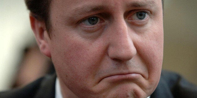 Leader of the Conservative party David Cameron listens to constituents of Reading East talking about the cost of living, in Cafe Giardino, in the Oracle shopping centre, Reading.