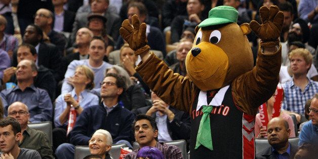 TORONTO, CANADA - OCTOBER 31: A fan dressed up as Yogi the Bear for Halloween cheers as the Indiana Pacers take the Toronto Raptors on October 31, 2012 at the Air Canada Centre in Toronto, Canada. NOTE TO USER: User expressly acknowledges and agrees that, by downloading and or using this photograph, User is consenting to the terms and conditions of the Getty Images License Agreement. (Photo by David Sandford/GettyImages)