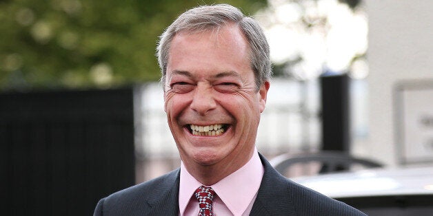 BIGGIN HILL, UNITED KINGDOM - MAY 23: United Kingdom Independence Party (UKIP) leader Nigel Farage smiles as he talks to reporters on May 23, 2014 near Biggin Hill, England. Early local election results announced overnight show substantial gains for UKIP. European election results will be released on May 25, 2014. (Photo by Peter Macdiarmid/Getty Images)