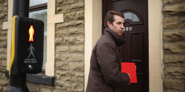 BLACKBURN, UNITED KINGDOM - MARCH 31: Labour candidate Will Straw walks the streets of Earcup ward in Blackburn canvassing for votes in the Rossendale and Darwen constituency of the 2015 election on March 31, 2015 in Blackburn, United Kingdom. Will Straw is the Labour candidate fighting for the Rossendale and Darwen constituency currently held by the conservatives and is the son of former Labour government home secretary Jack Straw. (Photo by Christopher Furlong/Getty Images)