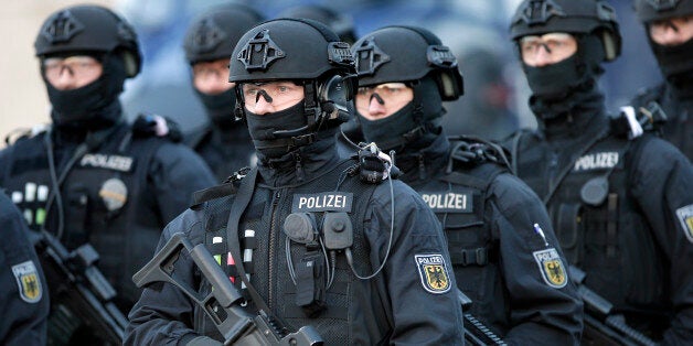 Police officers hold weapons during a training operation of the new BFE+ (Evidence and Arrestment) unit of the German federal police in Ahrensfelde near Berlin, Germany, Wednesday, Dec. 16, 2015. Germany on Wednesday introduced a new police unit that officials said will be better armed, outfitted and trained to deal with terrorism, based on an analysis of the countrys security in the wake of deadly attacks in Paris earlier this year. (AP Photo/Michael Sohn)