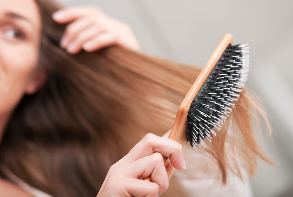 Bathtubs And Brushes Full Of Hair