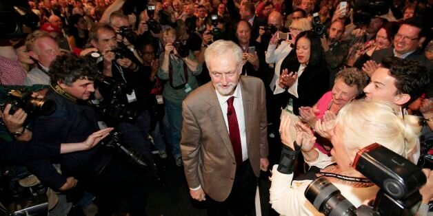 Labour Leader Jeremy Corbyn takes the applause of delegates following his keynote speech during the third day of the Labour Party conference at the Brighton Centre in Brighton, Sussex.