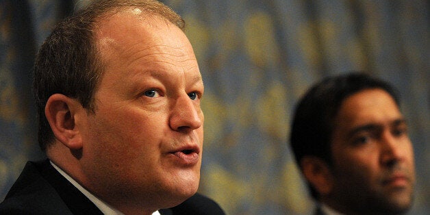 Simon Danczuk (L), a British Member of Parliament accompanying British national Nasir Shaikh (R), the brother of a murdered British tourist Khuram Shaikh, addresses reporters in Colombo on March 8, 2013. The brother of Khuram Shaikh, a Red Cross worker murdered while visiting Sri Lanka, flew to the country in an attempt to speed up the investigation into his death. AFP PHOTO/ Ishara S.KODIKARA (Photo credit should read Ishara S.KODIKARA/AFP/Getty Images)