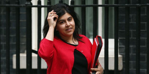 LONDON, ENGLAND - JUNE 09: Britain's Minister of State at the Foreign Office, Baroness Warsi arrives at 10 Downing Street on June 9, 2014 in London, England. The Education Secretary Michael Gove and and Home Secretary Theresa May were both called to attend a meeting at 10 Downing Street in London today with British Prime Minister David Cameron. The meeting was to discuss the alleged 'extremist takeovers' of schools in Birmingham, and was held on the same day that Ofsted released a report in to