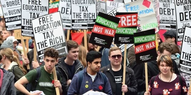 Students during a protest calling for the abolition of tuition fees and an end to student debt in Westminster, London.