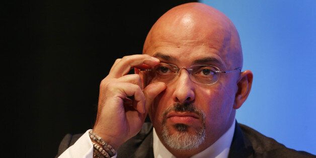 MP for Stratford on Avon Nadhim Zahawi adjusts his glasses during a discussion on 'The United Kingdom in Action' during the second day of the Conservative Party Conference