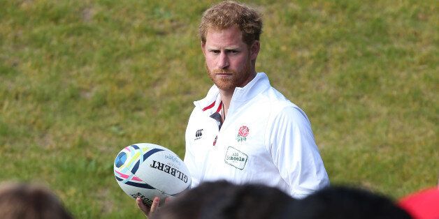 BAGSHOT, ENGLAND - OCTOBER 01: HRH Prince Harry watches England practice their scrummaging the England training session at Pennyhill Park on October 1, 2015 in Bagshot, England. (Photo by David Rogers/Getty Images)