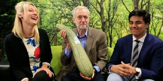 Labour party leader Jeremy Corbyn (centre) is presented with a marrow by local independent store 'HiSbe' as he talks with Claire Medhurst of Reborn Digital Marketing and Aadam Patel of Halal Celebrations, during a visit to the Brighton Hatchery, prior to the start of the annual Labour party conference at the Brighton Centre.