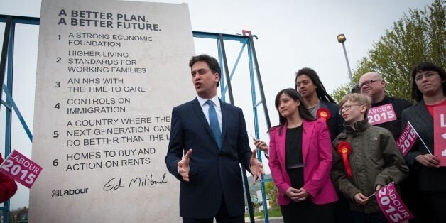 Labour leader Ed Miliband unveils Labour's pledges carved into a stone plinth in Hastings during General Election campaigning