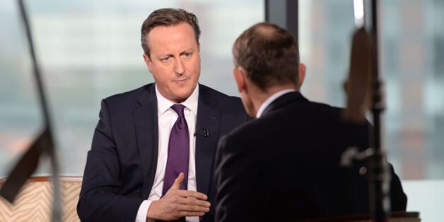 Prime Minister David Cameron (left) is interviewed by Andrew Marr on his BBC1 current affairs programme at Media City in Manchester, before the start of the Conservative Party annual conference.