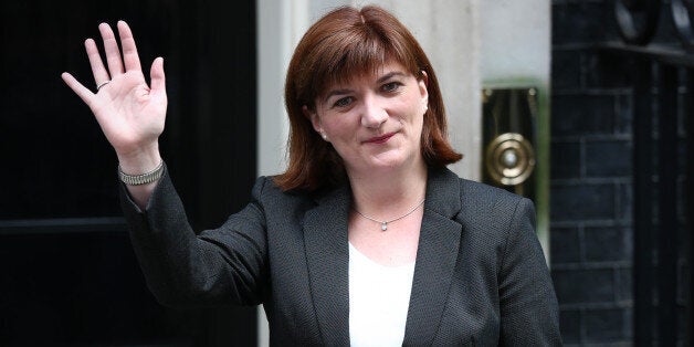 LONDON, ENGLAND - MAY 11: Nicky Morgan, who will continue as Secretary of State for Education, arrives at Downing Street on May 11, 2015 in London, England. Prime Minister David Cameron continued to announce his new cabinet with many ministers keeping their old positions. (Photo by Carl Court/Getty Images)