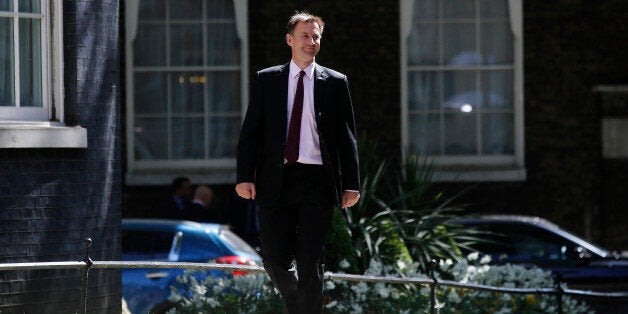 Jeremy Hunt, U.K. health secretary, arrives for the first weekly cabinet meeting of the new Conservative government in Downing Street, London, U.K., on Tuesday, May 12, 2015. U.K. Prime Minister David Cameron said London Mayor Boris Johnson will take part in meetings of his new cabinet, as he promoted Amber Rudd and Priti Patel to senior government posts. Photographer: Simon Dawson/Bloomberg via Getty Images