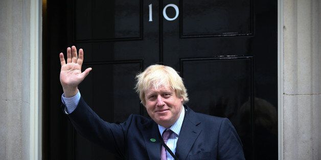 LONDON, ENGLAND - MAY 11: London Mayor and MP for Uxbridge and South Ruislip, Boris Johnson, arrives at Downing Street on May 11, 2015 in London, England. Prime Minister David Cameron continued to announce his new cabinet with many ministers keeping their old positions. (Photo by Carl Court/Getty Images)