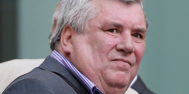 Former news editor of the News of the World Greg Miskiw arrives at Westminster Magistrates Court on phone hacking charges, in London, Thursday, Aug. 16, 2012. (AP Photo/Kirsty Wigglesworth)